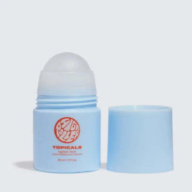 Ingrown hair treatment in a blue Topicals High Roller applicator bottle with the cap off on a light background